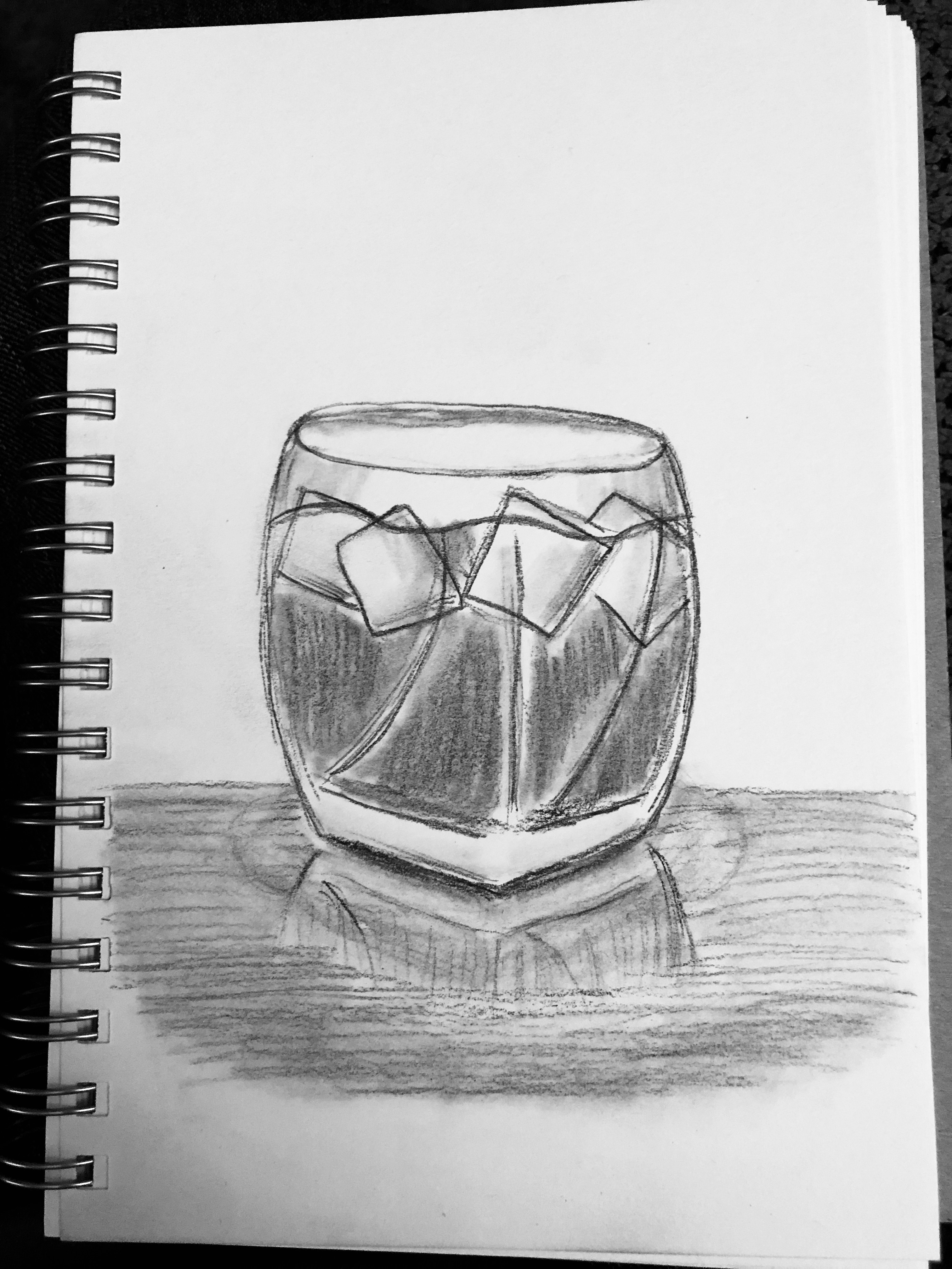 Charcoal drawing of a cocktail glass full of ice